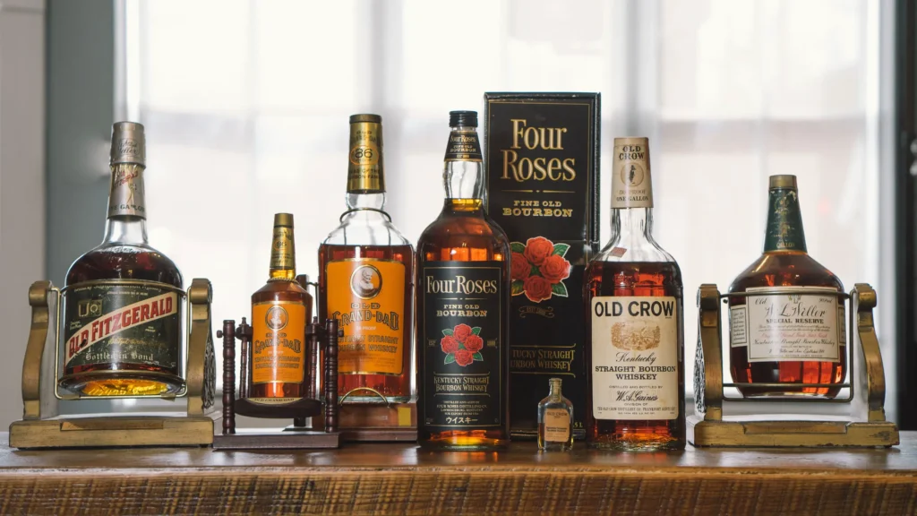 Vintage bourbon bottles on table